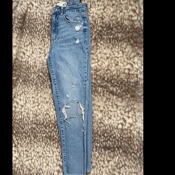 Ripped blue jeans - Picture 3 of 4
